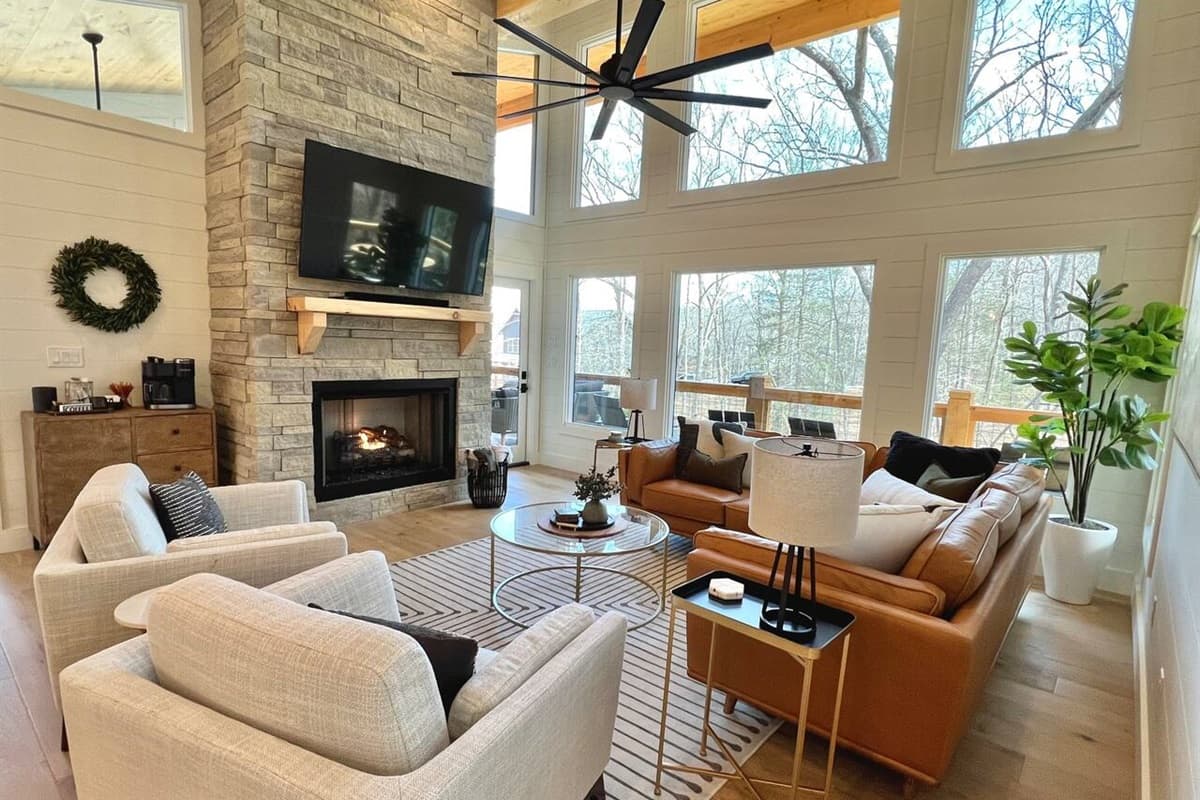 Enjoy all the natural light and the on demand gas fire place in this cozy living room. All TVs in the home are logged into several streaming services for your complimentary use during your stay!